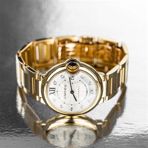 pre owned cartier gold watches.